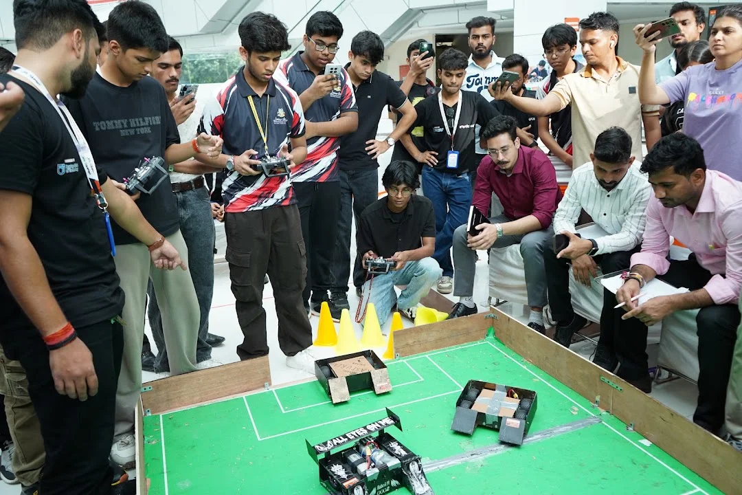 Competitors and spectators gathered beside the RGI 2026 pitch