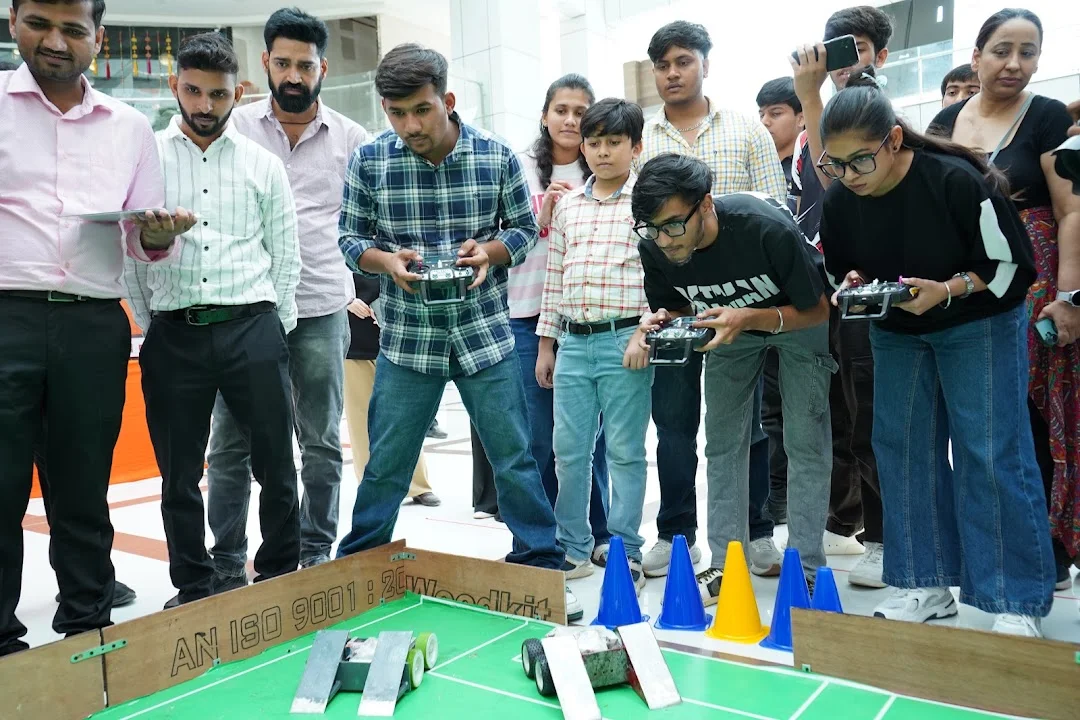 Competitors concentrating on robot control during RGI 2026