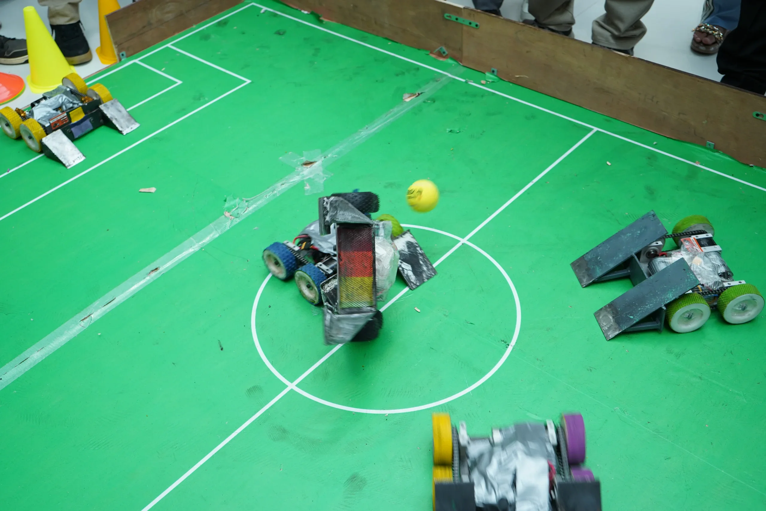 Robot pursuing the football across the RGI centre circle